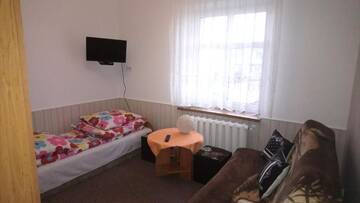 Фото номера Двухместный номер с 2 отдельными кроватями и собственной ванной комнатой Фермерские дома Pokoje Gościnne Strażnica г. Ярославец 2