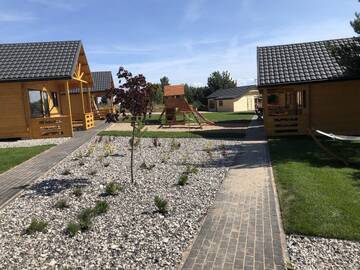Фото номера Шале с двумя спальнями Лоджи Ośrodek Wczasowy Kuba г. Ярославец 11